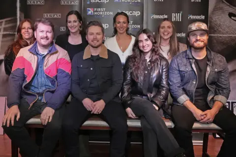 A group of musicians, including Alysa Vanderheym, pose for a photo at an event sponsored by SESAC, ASCAP, BMI, and Pinnacle Financial Partners.