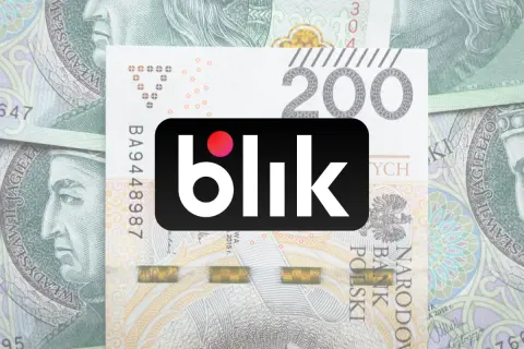 Logo Blik na tle banknotów 200 zł. Szybki i anonimowy przelew blik.