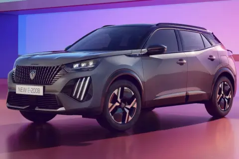 Nowy Peugeot E-2008 w stylowym szarym kolorze, z nowoczesnym designem i atrakcyjną ceną.