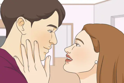 Un uomo e una donna si guardano intensamente, un momento intimo che potrebbe essere l'inizio di come avere una fidanzata.