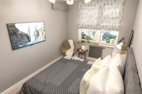 Gemütliches Schlafzimmer mit Bett, Fernseher und Fensterblick. Tolle Schlafzimmer Ideen für kleine Räume.