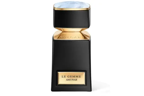 Elegancka butelka perfum Bvlgari Le Gemme Amunae w kolorze czarnym ze złotymi detalami i kamieniem na wieczku.