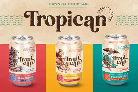 Trzy puszki z napojem "Tropican" o smaku limonki, pomarańczy i marakui. Idealne na lato!