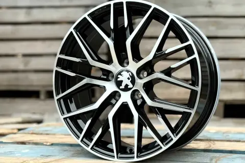 Elegancka felga do Peugeot 3008 GT, dwukolorowa, z logo lwa.