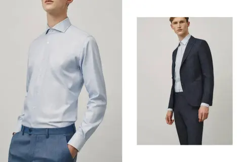 Uomo con camicia azzurra e pantaloni blu, e uomo con completo blu scuro e camicia a righe. Guida su come indossare una camicia da uomo.