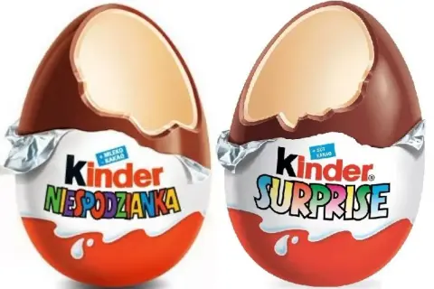 Dwa jajka Kinder Niespodzianka, jedno z napisem "NIESPODZIANKA", drugie "SURPRISE".