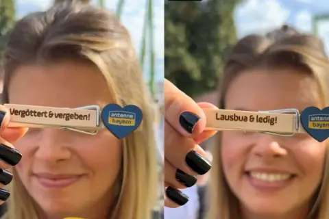 Frau hält Wäscheklammer mit Aufschrift "Lausbua & ledig!" und Antenne Bayern Logo. Beziehungsstatus: ledig.