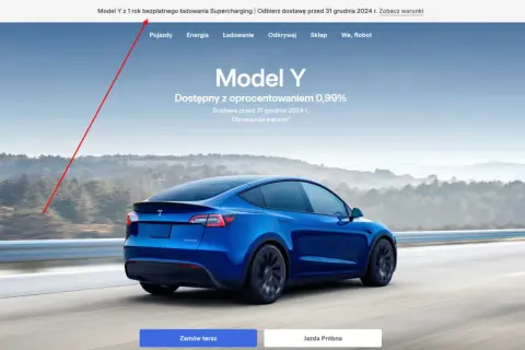 Niebieski Tesla Model Y na drodze. Czy ładowanie Tesli jest darmowe? Sprawdź warunki promocji na 1 rok darmowego ładowania Supercharging.