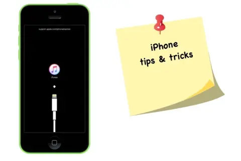 Zielony iPhone w trybie awaryjnym z ikoną iTunes i kablem. Obok żółta karteczka z napisem "iPhone tips & tricks". Dowiedz się, jak awaryjnie wyłączyć iPhone.