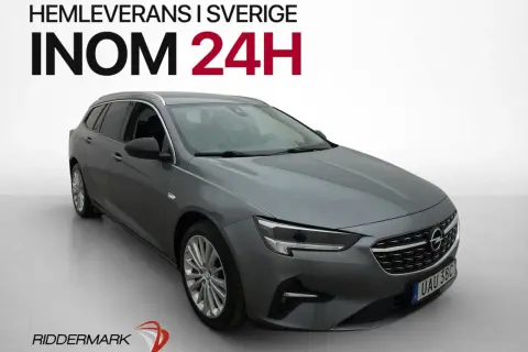 Grå Opel kombi, en av många Opel modeller, redo för hemleverans i Sverige inom 24 timmar.