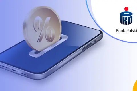 Złota moneta z symbolem procenta wsuwa się do slotu w smartfonie. To wizualizacja lokaty mobilnej PKO BP.