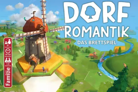Das Brettspiel "Dorfromantik" lädt zum Bauen und Gestalten ein. Ein Windrad dominiert die idyllische Landschaft.