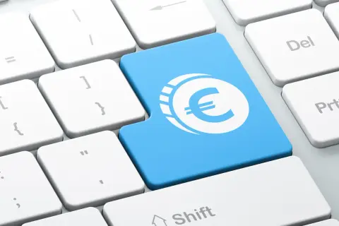 Klawisz Enter z symbolem euro. Dowiedz się, jak założyć konto walutowe w PKO.