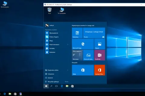 Widok pulpitu zdalnego z menu Start systemu Windows. Na pulpicie widoczny jest ten komputer.