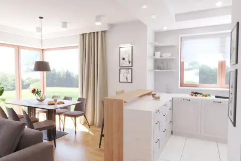 Jasne, przestronne wnętrze w stylu skandynawskim z jadalnią i aneksem kuchennym. Drewniane akcenty i jasne kolory tworzą przytulną atmosferę.