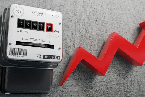 Licznik energii elektrycznej i czerwona strzałka w górę symbolizują wzrost cen prądu.