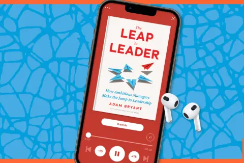 En mobiltelefon visar en ljudbok om ledarskap, "The Leap to Leader". Kanske kan den hjälpa till att motverka dålig arbetsmoral.