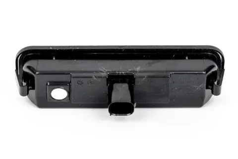 Lampa oświetlenia tablicy rejestracyjnej do Ford Focus MK3. Gotowa do wymiany żarówki.
