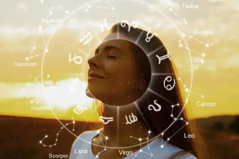 Una mujer con los ojos cerrados, rodeada por el zodíaco y constelaciones, como un ser de luz en armonía con el universo.