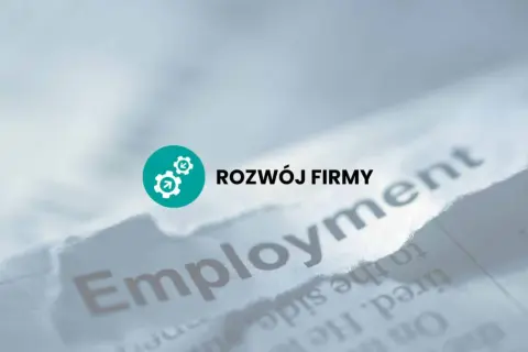 Rozwój firmy i prawa pracodawcy. Słowo "Employment" na podartym papierze.