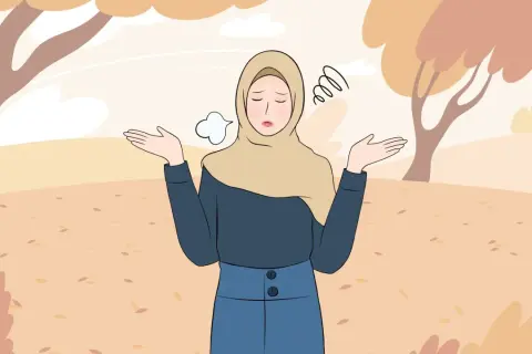 En kvinna i hijab med uppgivna armar och en suckande min, omgiven av höstlöv. Hon söker efter sätt att få bort ångest snabbt.