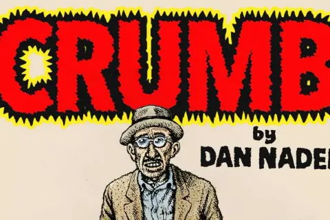 The word "CRUMB" in bold red letters with a jagged yellow and black outline. Below it, a portrait of a man with glasses and a hat, and the text "by DAN NADEL". This is a piece of art.