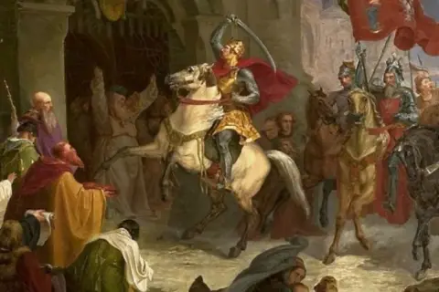Rycerz na koniu z mieczem wzniesionym ku górze, tłum wiwatujący. Czy żyją potomkowie polskich królów?
