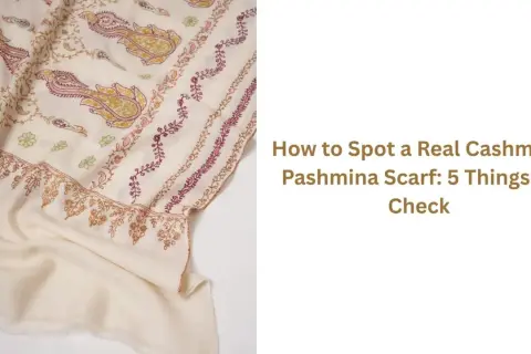 Jak rozpoznać kaszmir? Kremowy szal z haftem paisley i kwiatowym. Poradnik "How to Spot a Real Cashmere Pashmina Scarf".