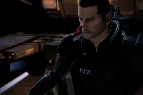 Komandor Shepard w zbroi N7, gotowy do akcji. Ten **Mass Effect 2 poradnik** pomoże Ci przetrwać!