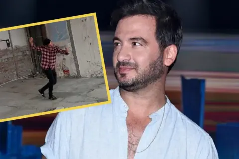 Stefano Terrazzino w kadrze, w tle jego taniec w surowym wnętrzu. Wzrost artysty jest imponujący.