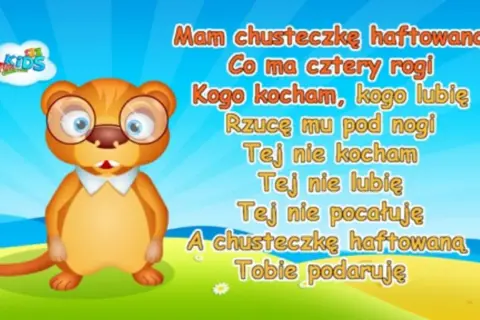 Uroczy, okularowy bóbr śpiewa piosenkę "Mam chusteczkę haftowaną" na tle błękitnego nieba i zielonej łąki.