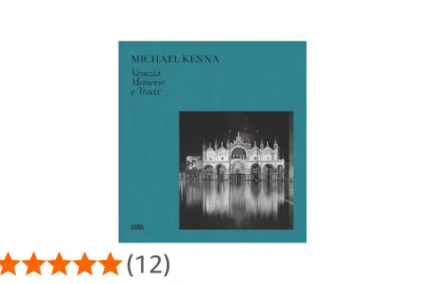 Copertina libro "Venezia. Memorie e Tracce" di Michael Kenna, con foto notturna della Basilica di San Marco riflessa sull'acqua.