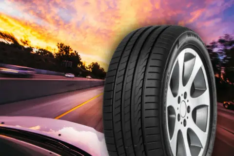 Un pneu Minerva sur une route au coucher du soleil. Avis pneu Minerva pour une conduite sûre et performante.