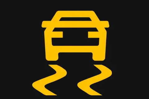 Voyant ESP allumé sur le tableau de bord, signalant une perte d'adhérence de la voiture.