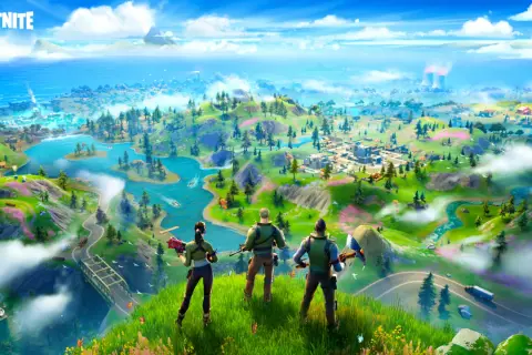 Trzech graczy patrzy na wyspę z gry Fortnite. To właśnie Fortnite, co to za gra? Kolorowa mapa z budynkami, rzekami i górami.