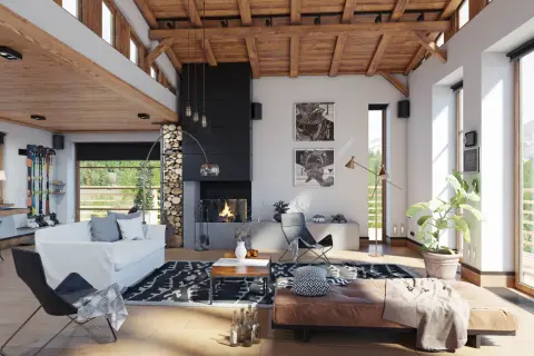 Gemütliches Wohnzimmer mit Kamin, Ledersofa und Skiern – moderne wohn trends im Alpenstil.