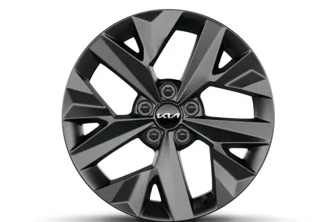Ciemnoszara felga Kia Sportage GT Line z pięcioramiennym, geometrycznym wzorem i nowym logo Kia.