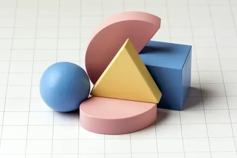 Kolorowe figury geometryczne: kula, sześcian, trójkąt i półkola na siatce.