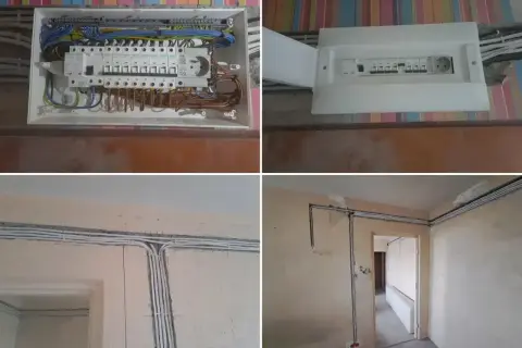 Nowe przewody i bezpieczniki w rozdzielnicy elektrycznej. Trwa wymiana instalacji elektrycznej, widać nowe kable i skrzynkę z zabezpieczeniami.
