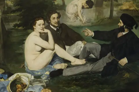 A nude woman and two clothed men on grass, a scene that caused a luncheon on the grass controversy. A second woman bathes in the background.