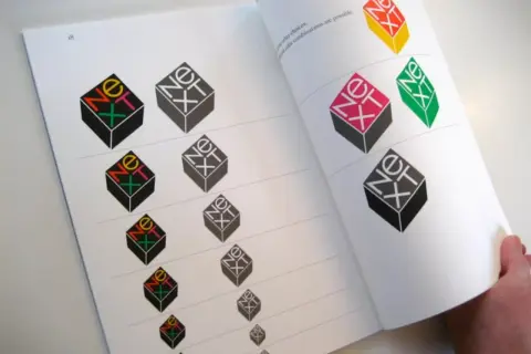 A book page displays variations of the iconic "NeXT" logo, showcasing Paul Rand's famous works and exploring different color combinations.