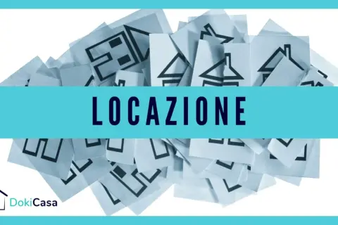Pile di fogli con icone di case. La parola "LOCAZIONE" è in evidenza. Utile per la restituzione deposito cauzionale subentro contratto locazione.