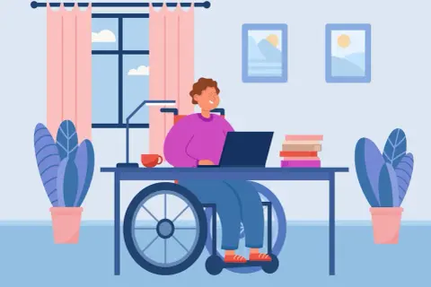 Personne en fauteuil roulant travaillant sur un ordinateur portable, cherchant des mdph aides financières pour son autonomie.