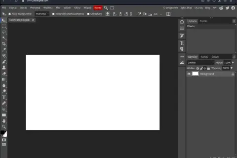Interfejs Photopea, darmowego programu do edycji grafiki online, podobnego do Photoshopa. Widoczny pusty obszar roboczy i panel warstw.