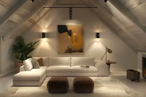 Przytulny salon na poddaszu z wygodną sofą i dwoma pufami. **Ledy na skosach** podkreślają architekturę wnętrza.