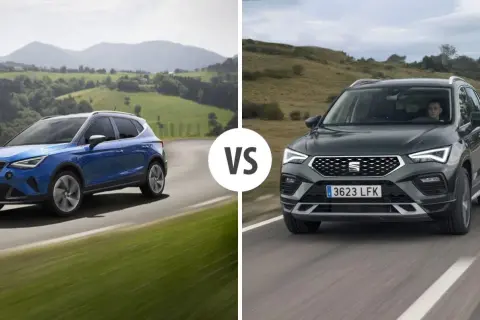 Niebieski i ciemnoszary SEAT SUV jadące po krętych drogach w malowniczych krajobrazach.