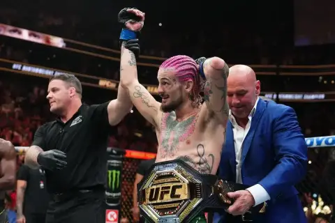 Sean O'Malley wins by split decision vs. Petr Yan, UFC President Dana White presents the belt.