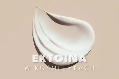 Gładka, biała emulsja na beżowym tle. Napis "EKTOINA W KOSMETYKACH" sugeruje jej cenne właściwości.