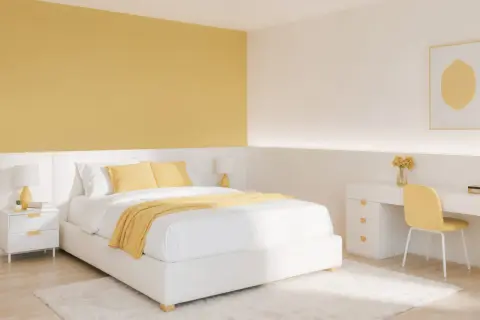 Chambre lumineuse avec un mur de couleur jaune moutarde, un lit blanc, une table de chevet et un bureau.