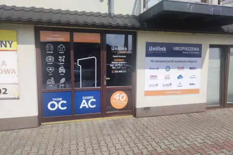 Witryna biura ubezpieczeniowego Unilink z ofertą OC i AC oraz logo 40 ubezpieczycieli.